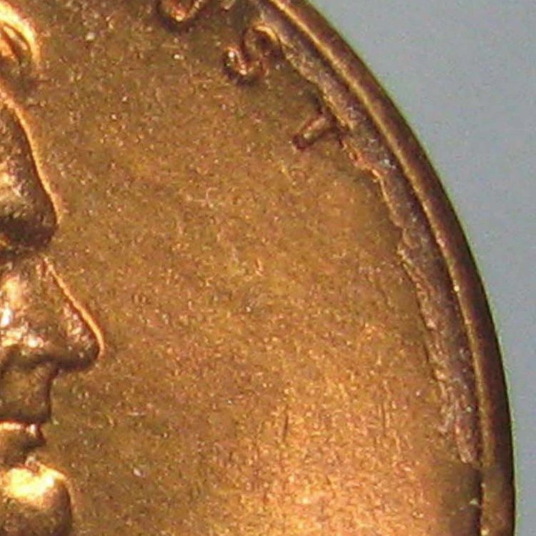 1949-D-Lincoln-Cent---Extra-Metal-Along-Rim-.-.-.-Is-It-A-Cud?
